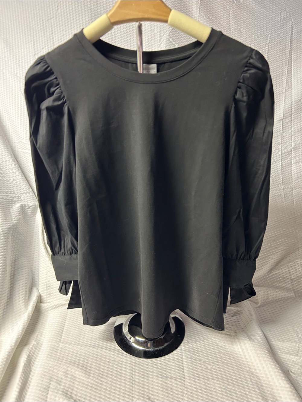 Chico's Black Puff-Sleeve Crewneck Blouse with bows at cuff.